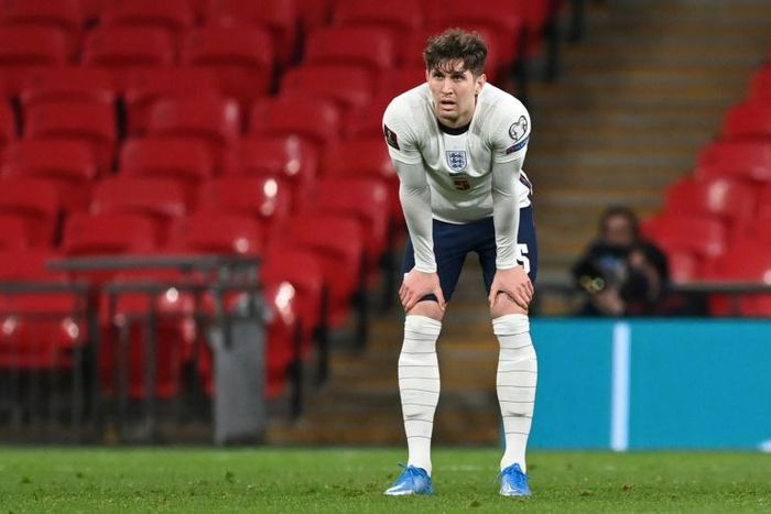 England defender John Stones reacts after his error led to Poland's equaliser in their World Cup qualifier at Wembley