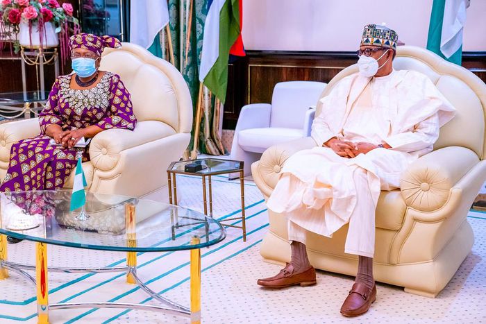 Director General of World Trade Organisation (WTO), Dr Ngozi Okonjo-Iweala (left) with President Muhammadu Buhari (right) [Presidency]