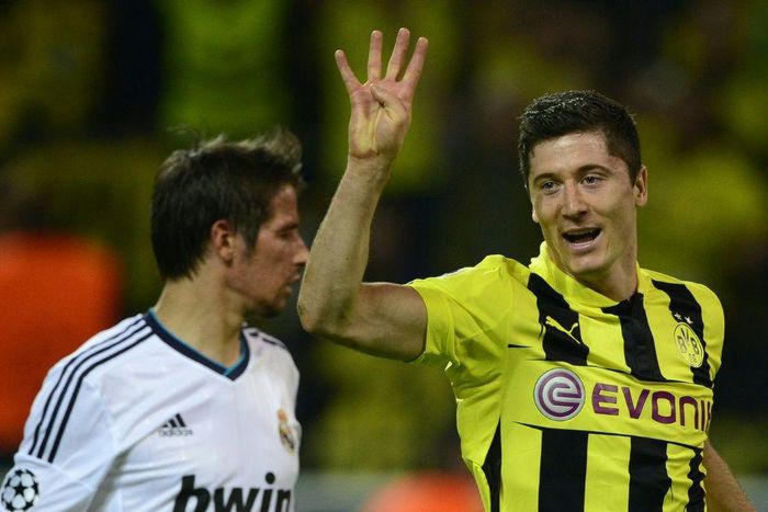 Robert Lewandowski celebrates his four goals for ex-club Dortmund against Real Madird in the Champions League semi-finals in April 2013