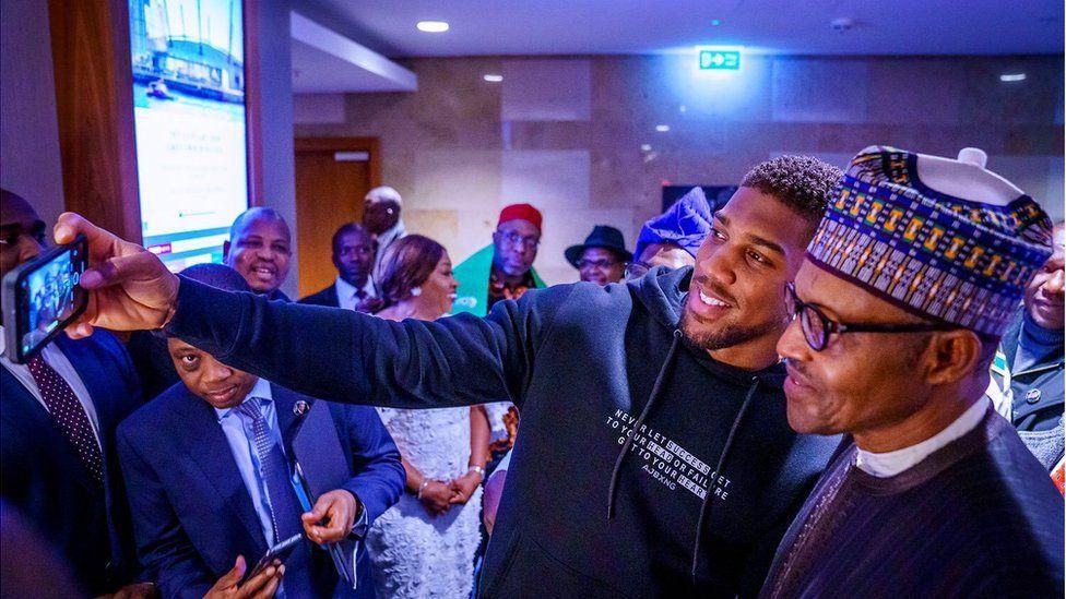 President Muhammadu Buhari celebrates Anthony Joshua (BBC)