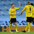 Borussia Dortmund captain Marco Reus (L) celebrates his goal at Manchester City in Tuesday's 2-1 away defeat