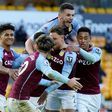 Aston Villa celebrate their win at Wolves