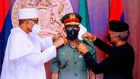 President Muhammadu Buhari and Vice President Yemi Osinbajo decorate the Chief of Defence Staff, Gen. Lucky Irabor with his new rank. [Presidency]