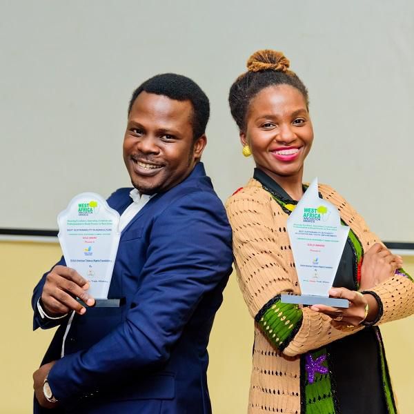 General Manager, BATNF, Ololade Johnson; and Project Manager, British American Tobacco Nigeria Foundation (BATNF), Dare Odusanya, displaying the awards won by BATN Foundation