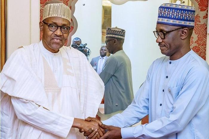President Muhammadu Buhari in a handshake with NNPC GMD Mele Kyari. [thewhistler]