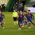 Barcelona celebrate their penalty shootout win over Real Sociedad in the semi-finals of the Spanish Super Cup