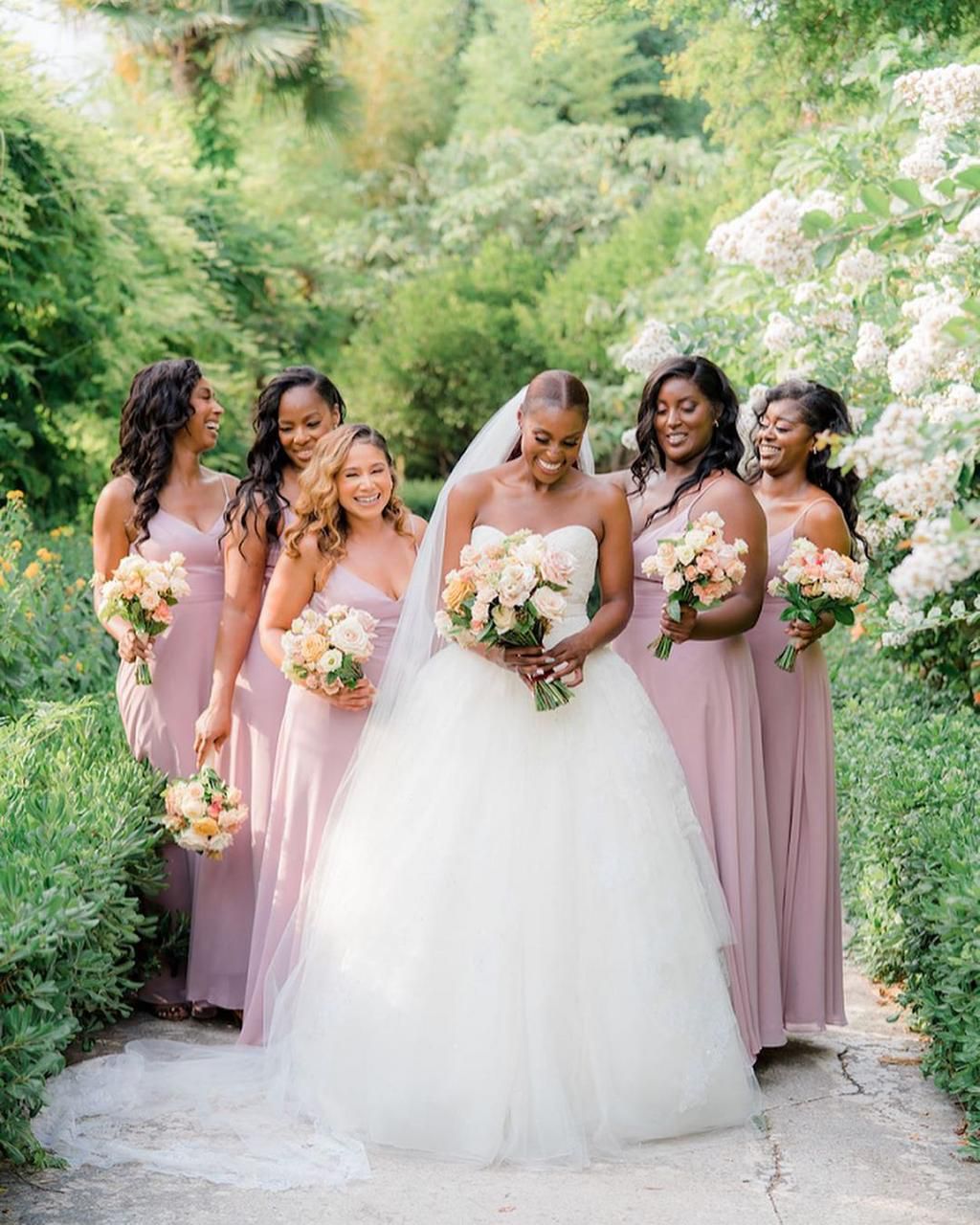 The movie star and her bridal train [Instagram/IssaRae]