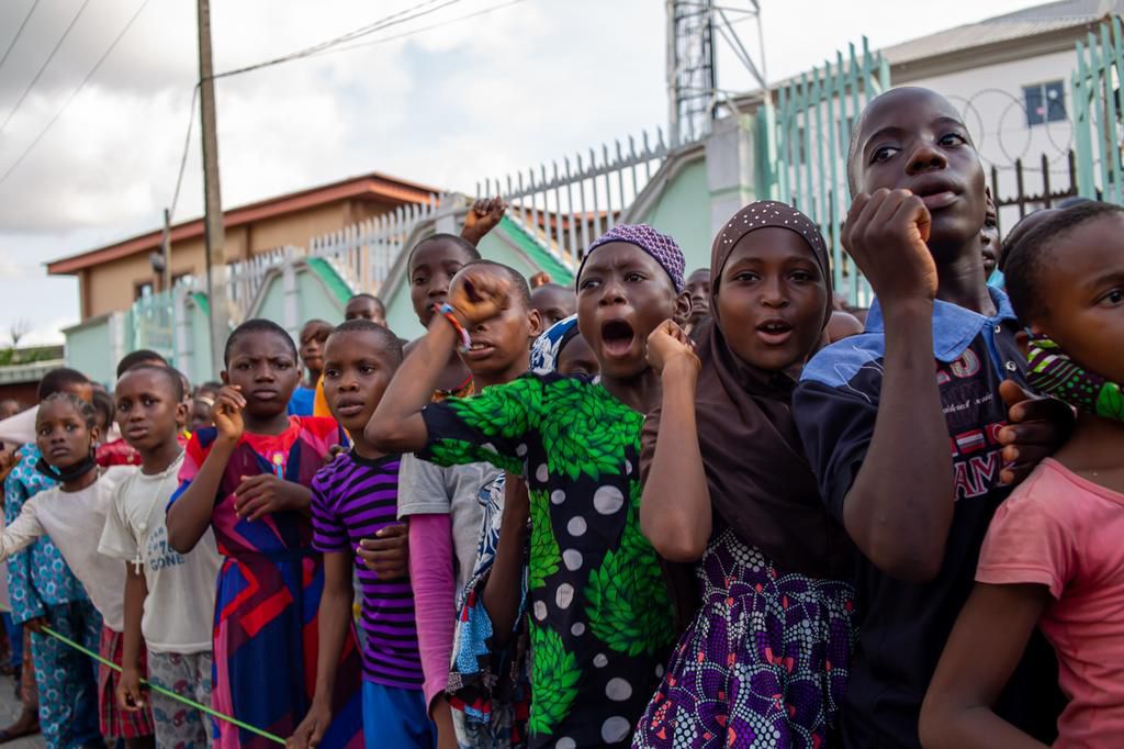 Champion and family man, Kamaru Usman shares an unforgettable CSR experience, feeds 1000 children