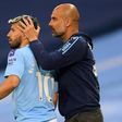 Pep Guardiola (right) is counting on Sergio Aguero's (left)return to help ease Manchester City's goal drought