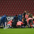 Schalke forward Mark Uth receives medical treatment