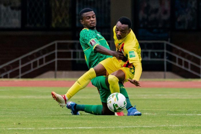 South Africa midfielder Teboho Mokoena (L) and Zimbabwe forward Khama Billiat (R) clash during a World Cup qualifier in Harare on Friday