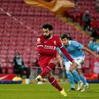 Mohamed Salah levels for Liverpool from a penalty in a 4-1 loss to Manchester City at Anfield.