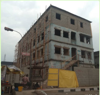 A dilapidated two-storey building raised to three in Ebute Metta has neared completion (Pulse)