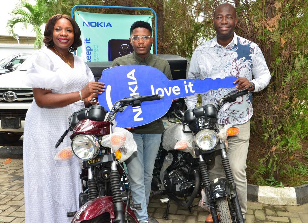L-R: Coordinating Managing Director, TD Africa, Chimere Chioma; Manager, Mega Station, Oshiyemi Temitayo and Senior Business Manager(West Africa), HMD Mobile Nigeria Limited, Emmanuel Ossai during the presentation of trucks and delivery bikes to custom...