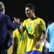 Brazil's coach Tite greets goal-scorer Roberto Firmino after defeating Venezuela 1-0 in their closed-door World Cup qualifier in Sao Paulo on Friday