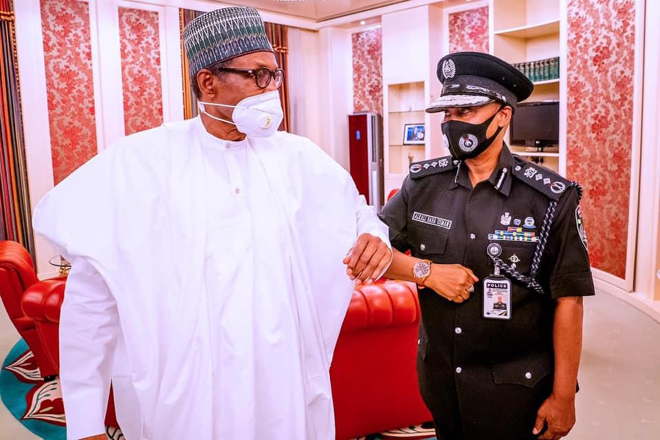President Muhammadu Buhari with the Inspector-General of Police, Usman Baba Alkali [Presidency]