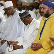 Senate President Bukola Saraki, President Buhari and other dignitaries praying