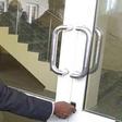 The Lagos CJ, Justice Kazeem Alogba, opening the door to the newly built Osbourne Courthouse on Thursday