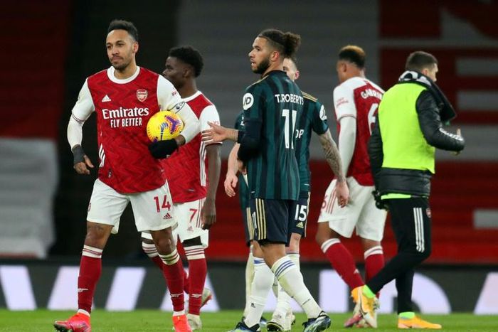 Pierre-Emerick Aubameyang (L) maintains a tradition of hat-trick scorers keeping the match ball after his treble for Arsenal in a 4-2 win over Leeds.