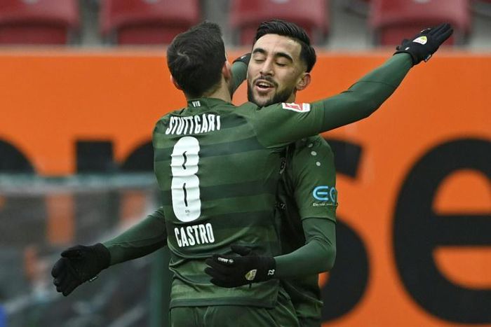 Stuttgart forward Nicolas Gonzalez (R) celebrates with Gonzalo Castro after scoring against Augsburg on Sunday
