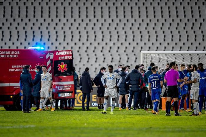An ambulance prepares to take Porto's Nanu to hospital after colliding with Belenenses' Russian goalkeeper Stanislav Kritsyuk