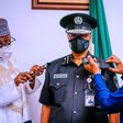 Vice President Osinbajo decorates new acting IGP Usman Baba at the State House Abuja on Wednesday April 7, 2021 (Tolani Alli)