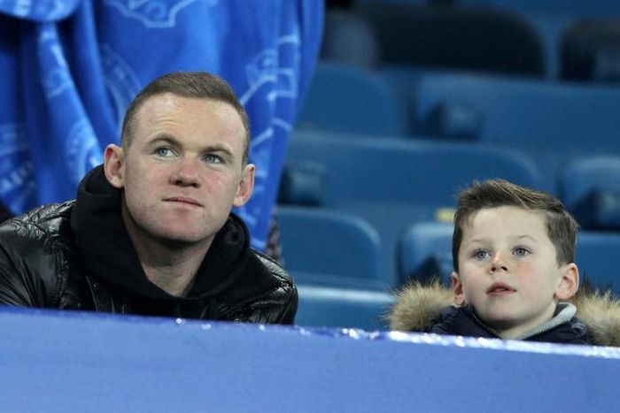 Former Manchester United forward Wayne Rooney pictured with his son, Kai, in 2015