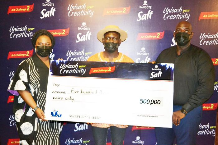 Photo Credit: L-R: Chief Financial Officer, NASCON Allied Industries PLC, Mrs. Aderemi Saka, Overall Winner, Dangote Salt Art Challenge 2, Timothy Undiandeye  Head of Marketing, NASCON Allied Industries PLC, Olusegun Ajala; at the Dangote Salt Art Chal...