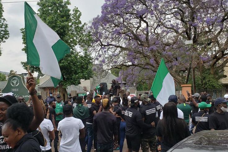 Nigerians living in South Africa protest in solidarity with youths back home protesting misgovernance and police brutality on Wednesday, Oct. 21, 2020 in Praetoria.  [Twitter/@NewsWireNGR]