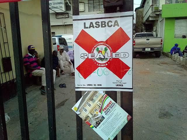 LASBCA officials seal a property in Lagos. (Reference Daily News)