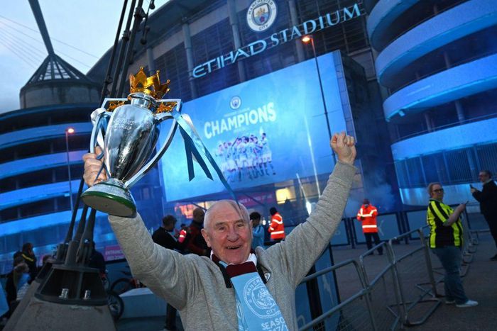 Manchester City fans celebrate winning the Premier League title