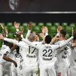 Lille players celebrate after climbing sx points clear in Ligue 1