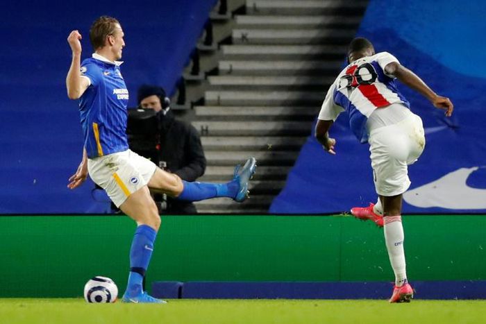 Benteke brilliance: Christian Benteke (right) snatched a 2-1 win for Crystal Palace away to Brighton on Monday