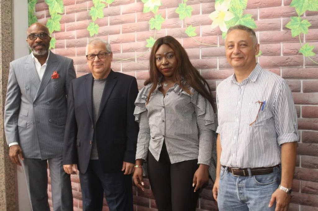 L-R: Executive Vice Chairman, Funds and Electronic Transfer Limited, Prof. Mustapha Akinkunmi; Group Managing Director, Allied Foods and Confectionery Services Limited (franchisee of Burger King), Mr Antoine Zammarieh; Marketing Coordinator, Burger Kin...