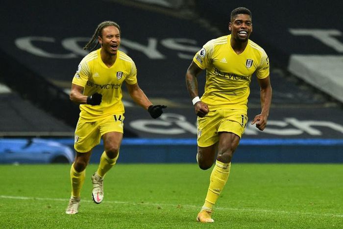 Fulham's Ivan Cavaleiro (R) celebrates scoring against Tottenham