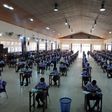 Student writing WASSCE WAEC