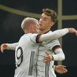 Luca Waldschmidt (R) celebrates scoring Germany's winning goal in Leipzig