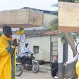 Archbishop Samson Benjamin embarks on a one-man protest with a coffin on his head