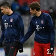 Mueller (R) admits the loss of top-scorer Lewandowski (L) to injury is 'bad timing' for the club world champions