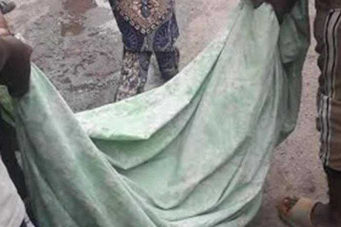 The body of the victim wrapped with a piece of cloth (Punch)