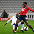 Jonathan David (R) scored the goal which allowed Lille to keep pace in the Ligue 1 title race
