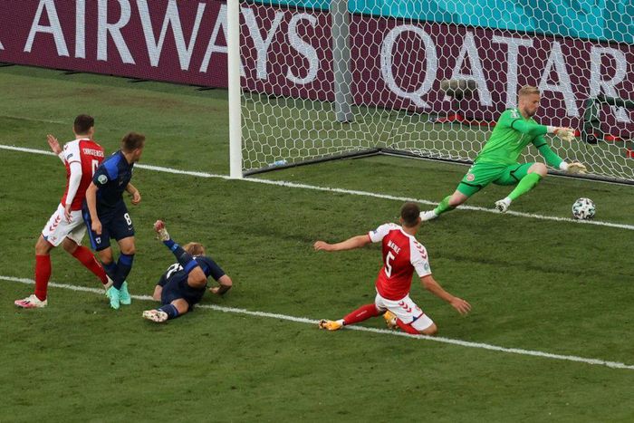 Joel Pohjanpalo, on the ground, won the game for Finland after Denmark's Christian Eriksen collapsed and had to be revived