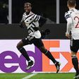 Paul Pogba (L) came off the bench to score for Manchester United at AC Milan.