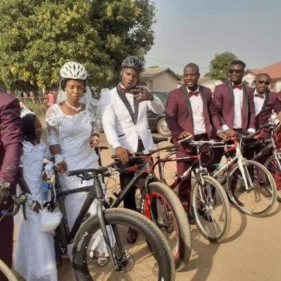 Female cyclist’s beautiful wedding full of bicycles; no car