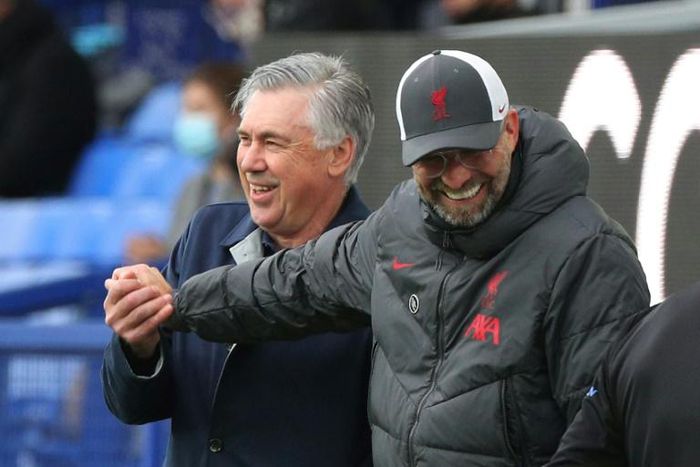 Everton boss Carlo Ancelotti (left) pits his wits against Liverpool manager Jurgen Klopp this weekend