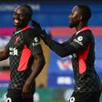 Liverpool forward Sadio Mane (left) celebrates scoring against Crystal Palace