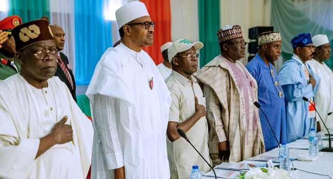 Bola Ahmed Tinubu, President Muhammadu Buhari and Adams Oshiomhole during campaign council meeting (Channels TV)