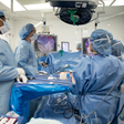 In this Monday, Dec. 16, 2019 photo, Dr. Neil Floch, second from left, performs gastric bypass surgery laparoscopically, using monitors to guide him at Nuvance Health's hospital in Norwalk, Conn. Obesity surgery is becoming a more common way to lose we...