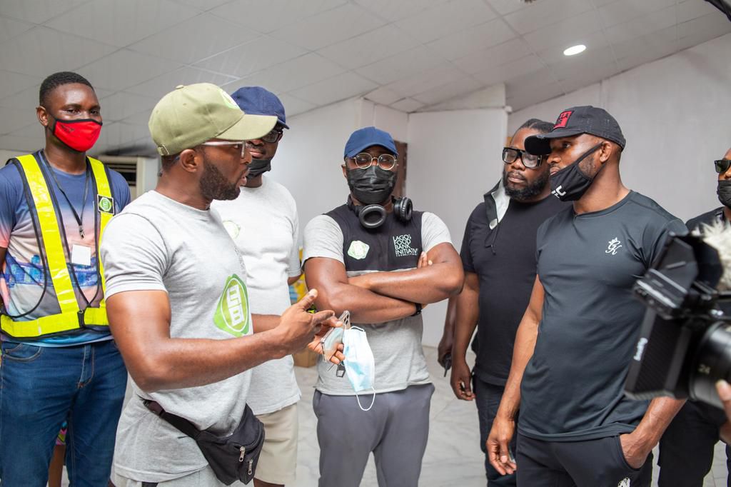 Champion and family man, Kamaru Usman shares an unforgettable CSR experience, feeds 1000 children