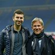 Parma's US owner Kyle J. Krause (R) and his son Tanner before a Serie A match against AC Milan in December 2020.